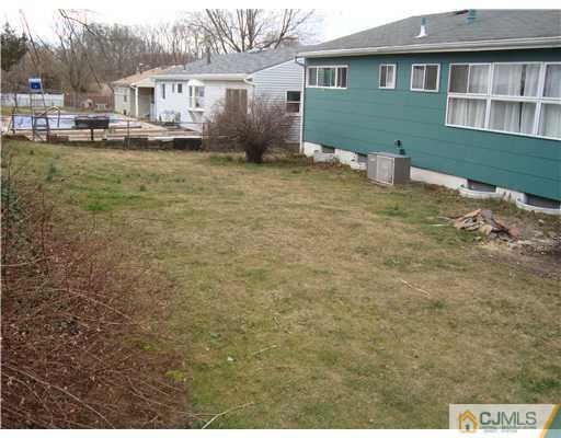 8 Yale Road Old Bridge, NJ 08859 - Photo 14 of 14 a house view with a garden space