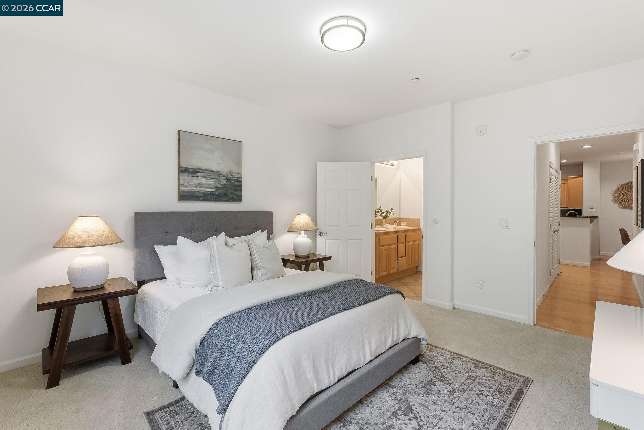 Dublin Ranch Dublin, CA 94568 - Photo 7 of 18 a bedroom with a bed and wooden floor