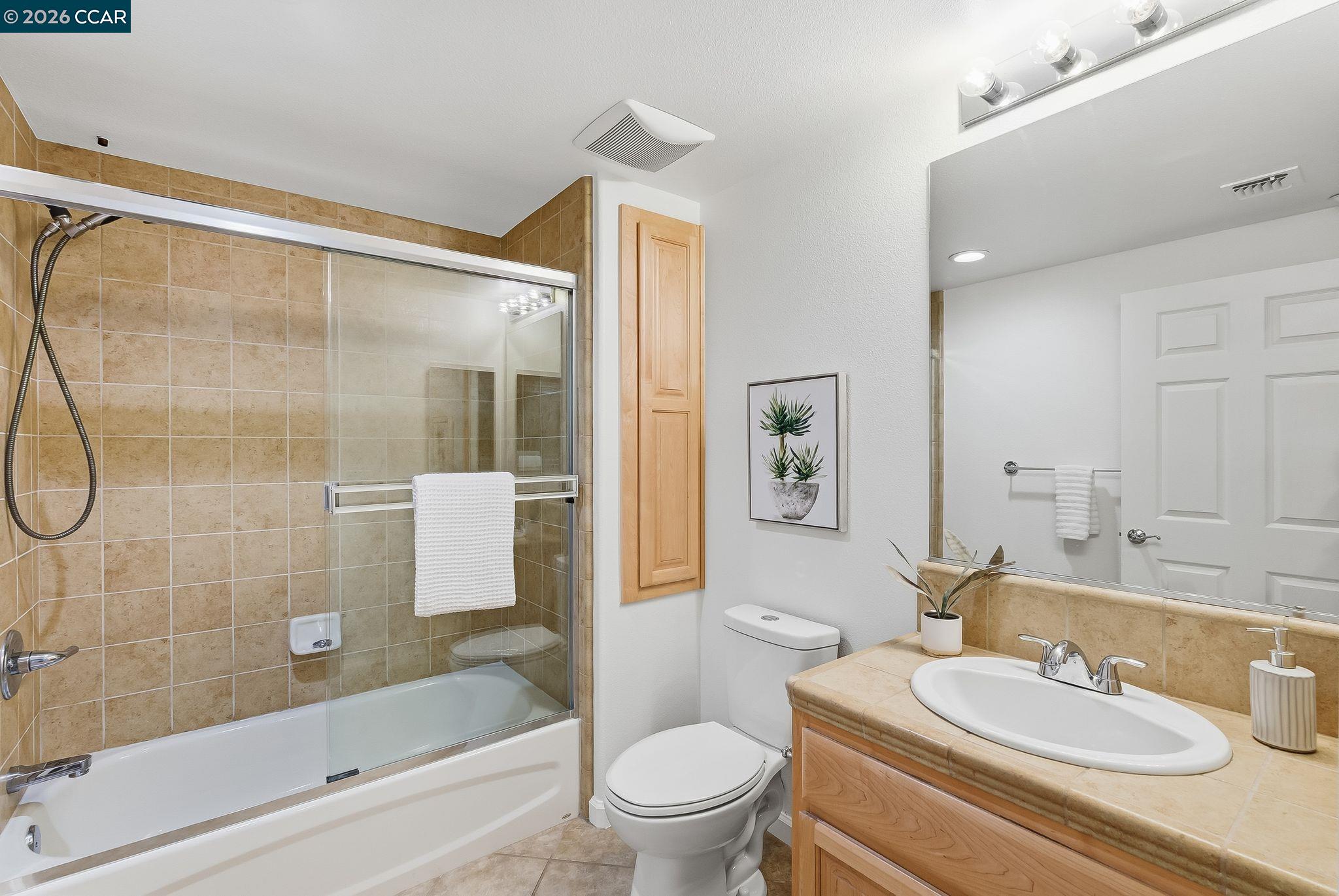 Dublin Ranch Dublin, CA 94568 - Photo 8 of 18 a bathroom with a sink granite toilet and shower