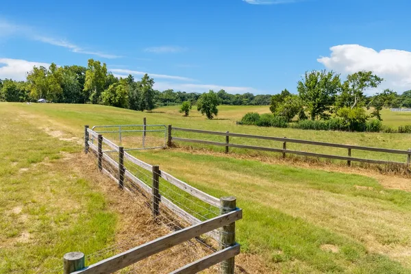 a view of an outdoor swimming pool and an outdoor seating