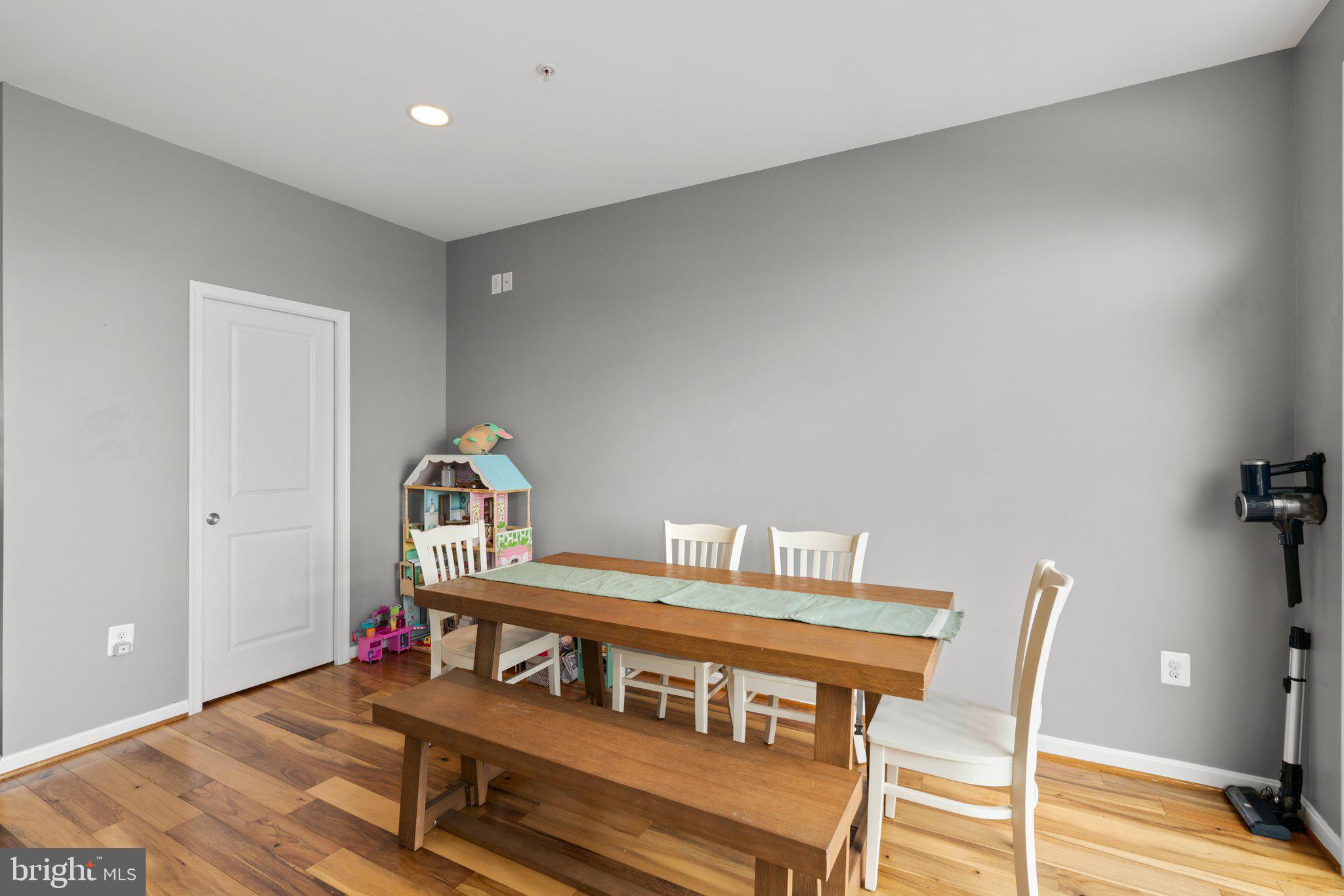 1338 Lowman Street Baltimore, MD 21230 - Photo 25 of 72 a bedroom with furniture and a wooden floor