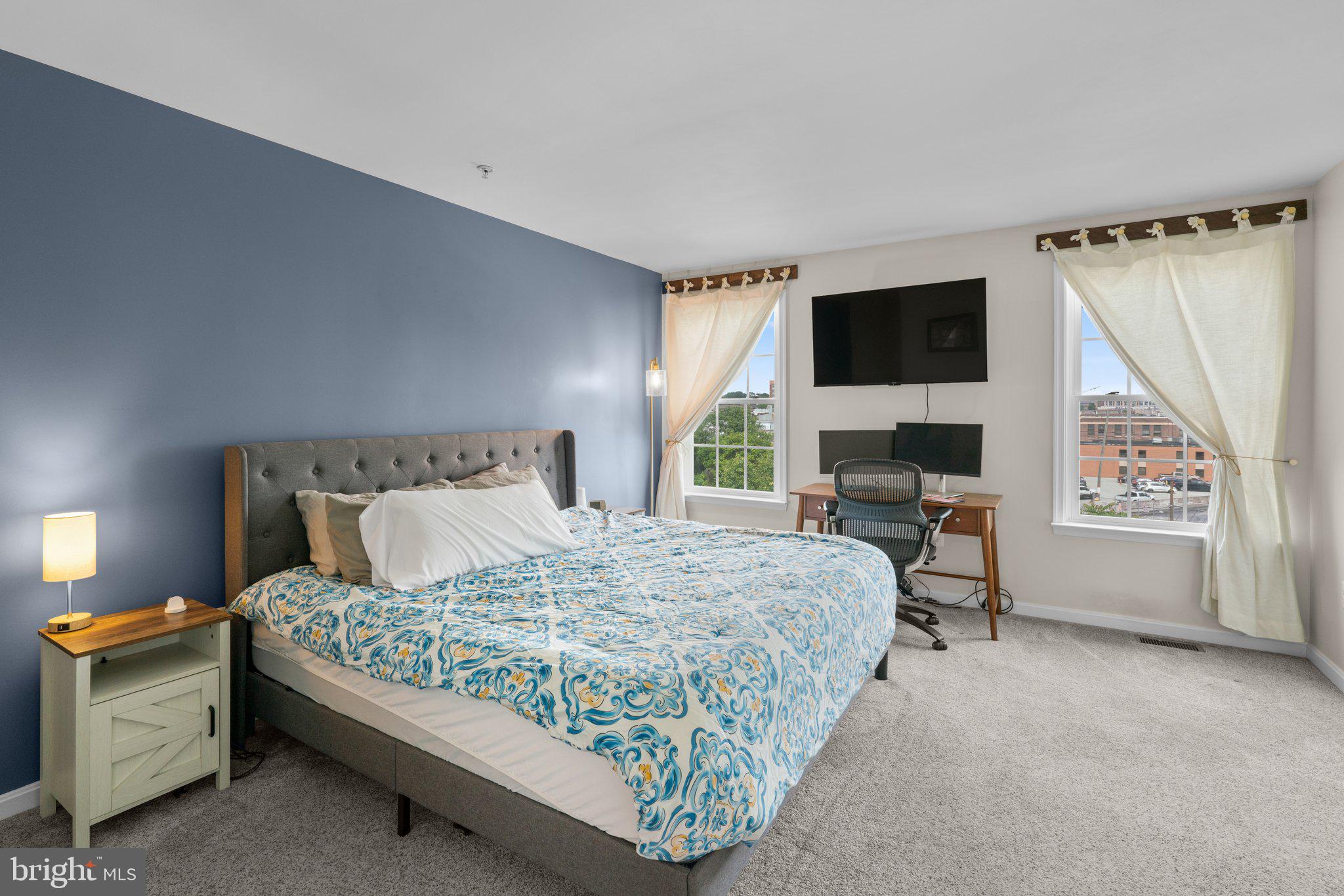 1338 Lowman Street Baltimore, MD 21230 - Photo 31 of 72 a bedroom with a bed and a television