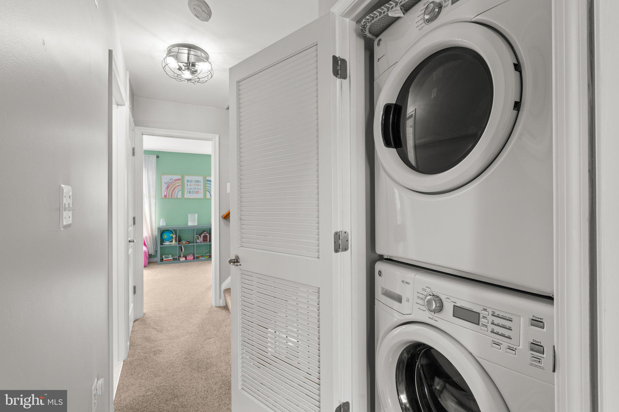 1338 Lowman Street Baltimore, MD 21230 - Photo 43 of 72 a view of a hallway with washer and dryer
