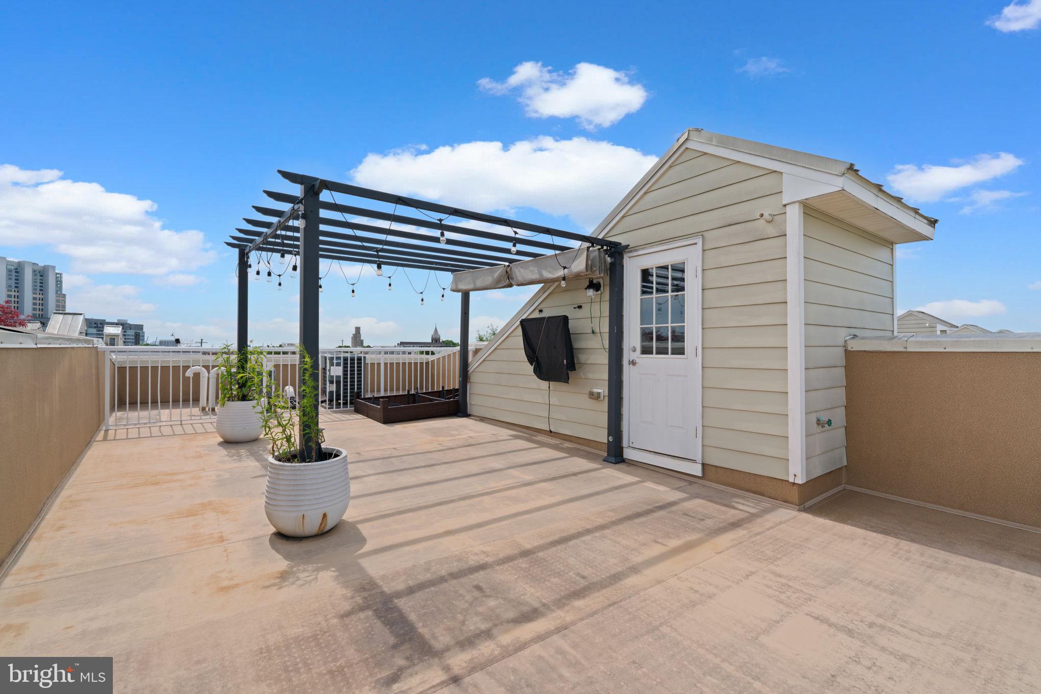 1338 Lowman Street Baltimore, MD 21230 - Photo 47 of 72 a view of a house with a patio