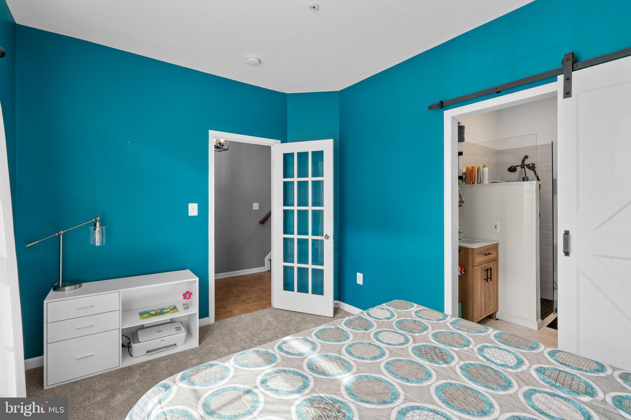 1338 Lowman Street Baltimore, MD 21230 - Photo 7 of 72 a bedroom with a bed and a view of bathroom