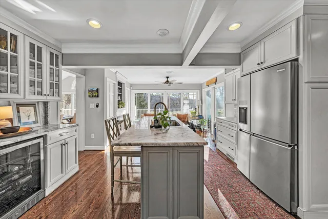 a kitchen with stainless steel appliances granite countertop a stove and a sink