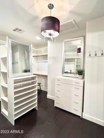 a bath room with a bathtub and a window
