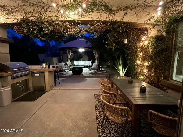 a view of an chairs and tables in the patio