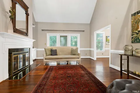 a spacious bedroom with a bed and a couch