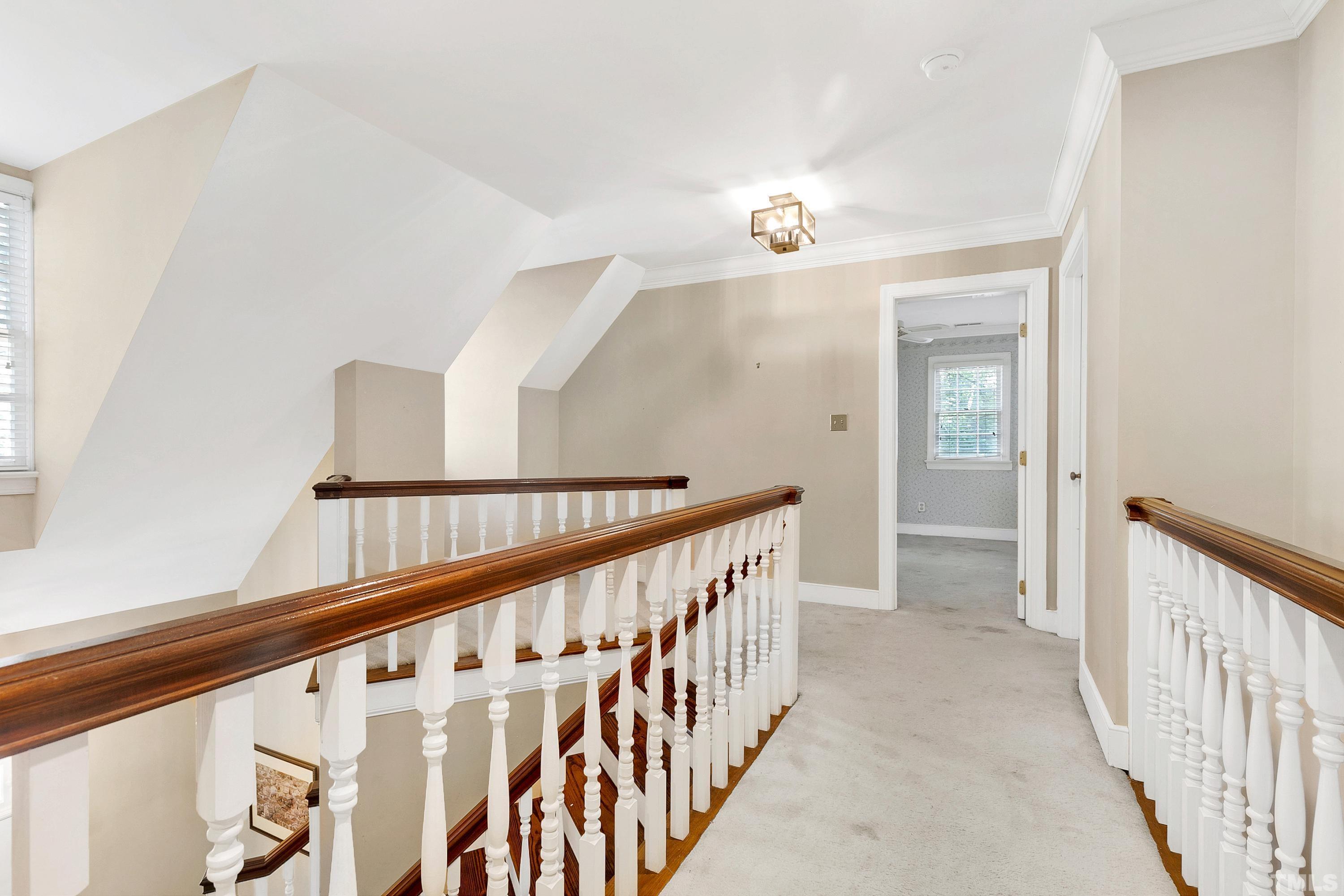 113 Palace Green Cary, NC 27518 - Photo 18 of 32 a view of a hallway with staircase