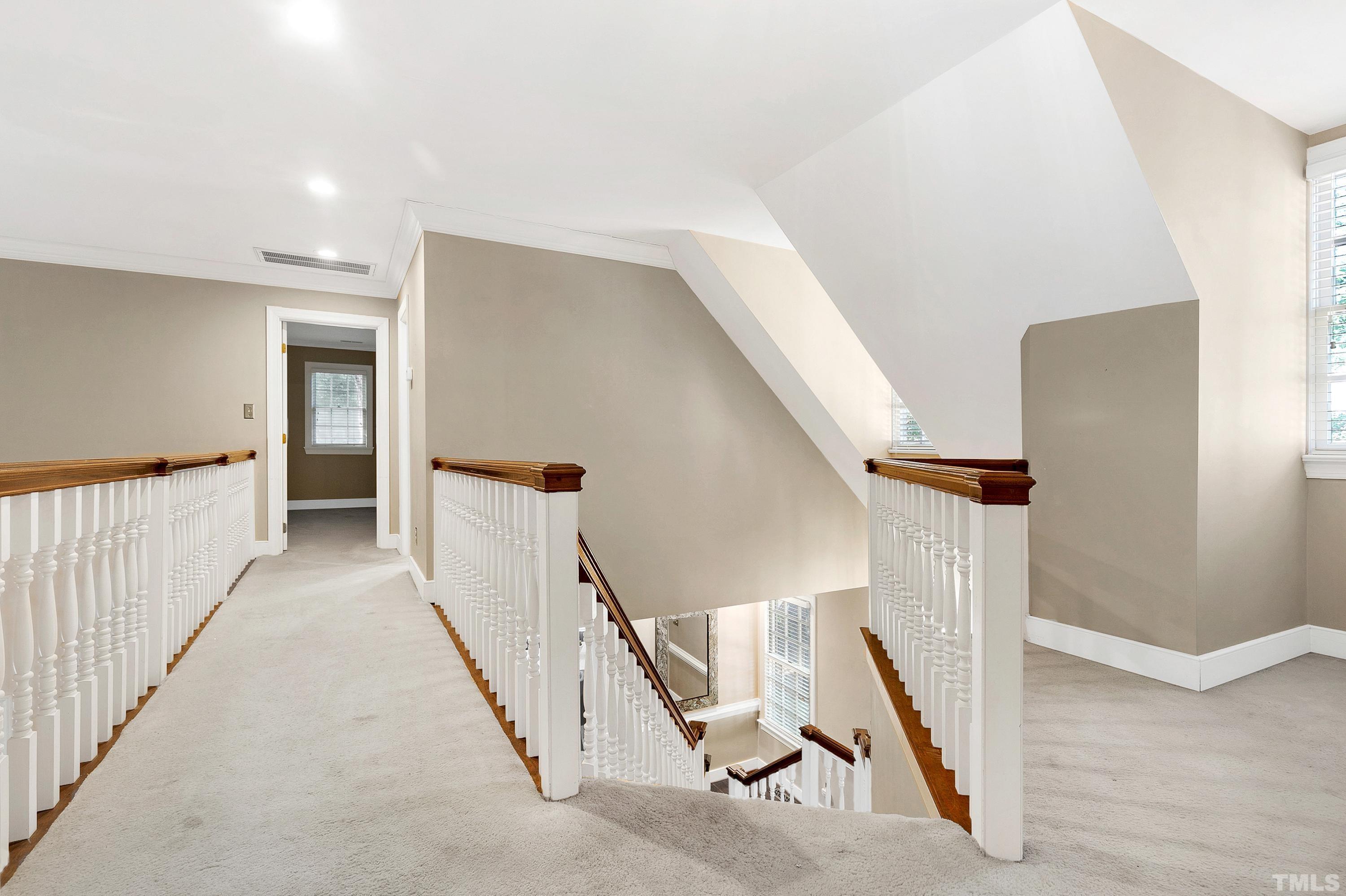 113 Palace Green Cary, NC 27518 - Photo 20 of 32 a view of a hallway with staircase