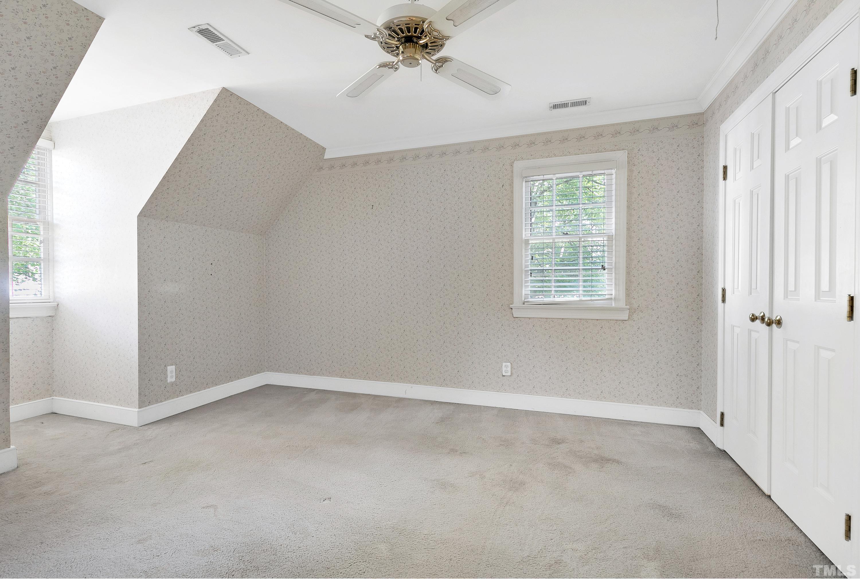 113 Palace Green Cary, NC 27518 - Photo 21 of 32 a view of an empty room with a window