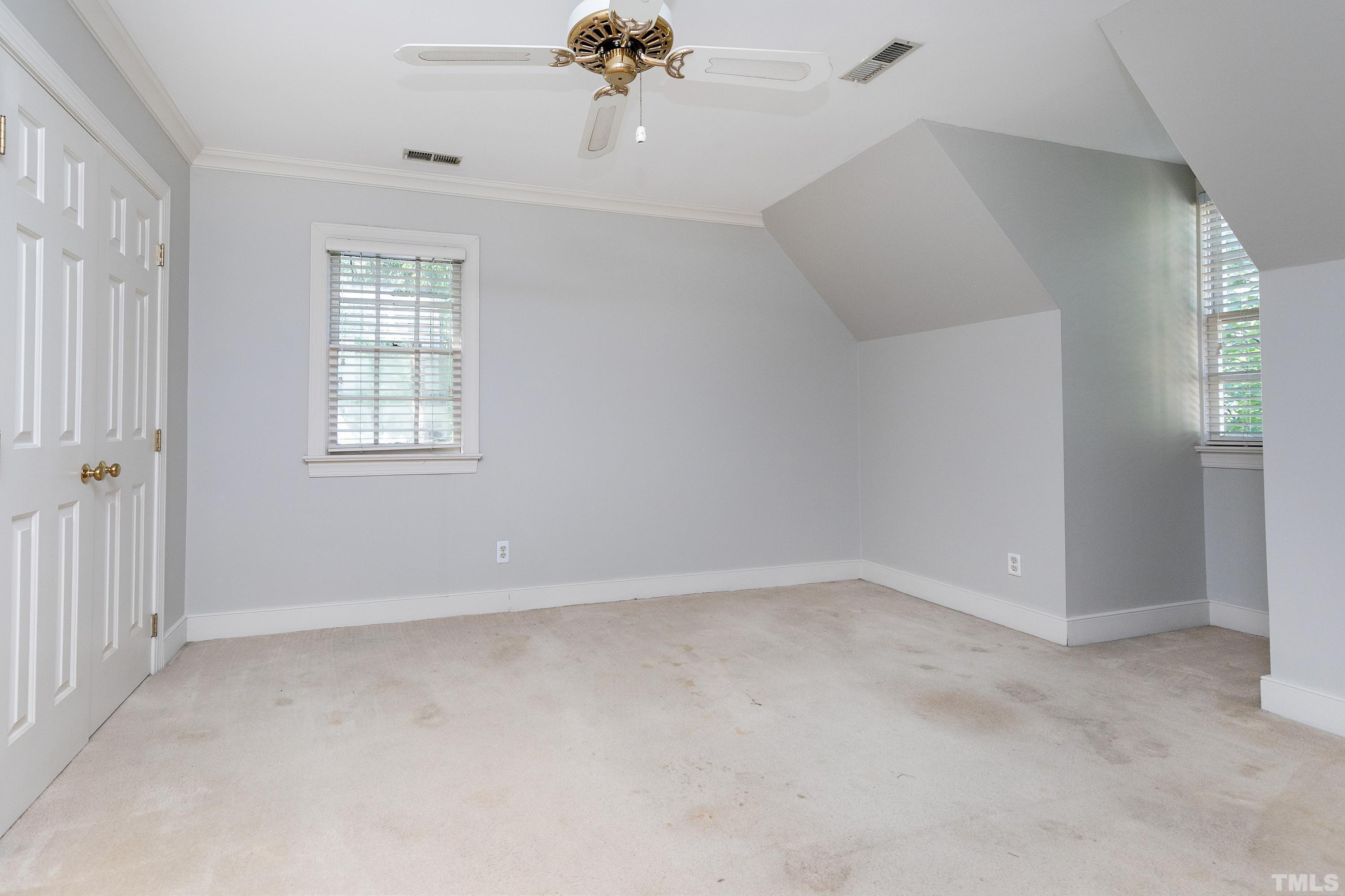 113 Palace Green Cary, NC 27518 - Photo 24 of 32 a view of an empty room with a window