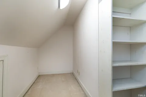 a view of a house with backyard and garden