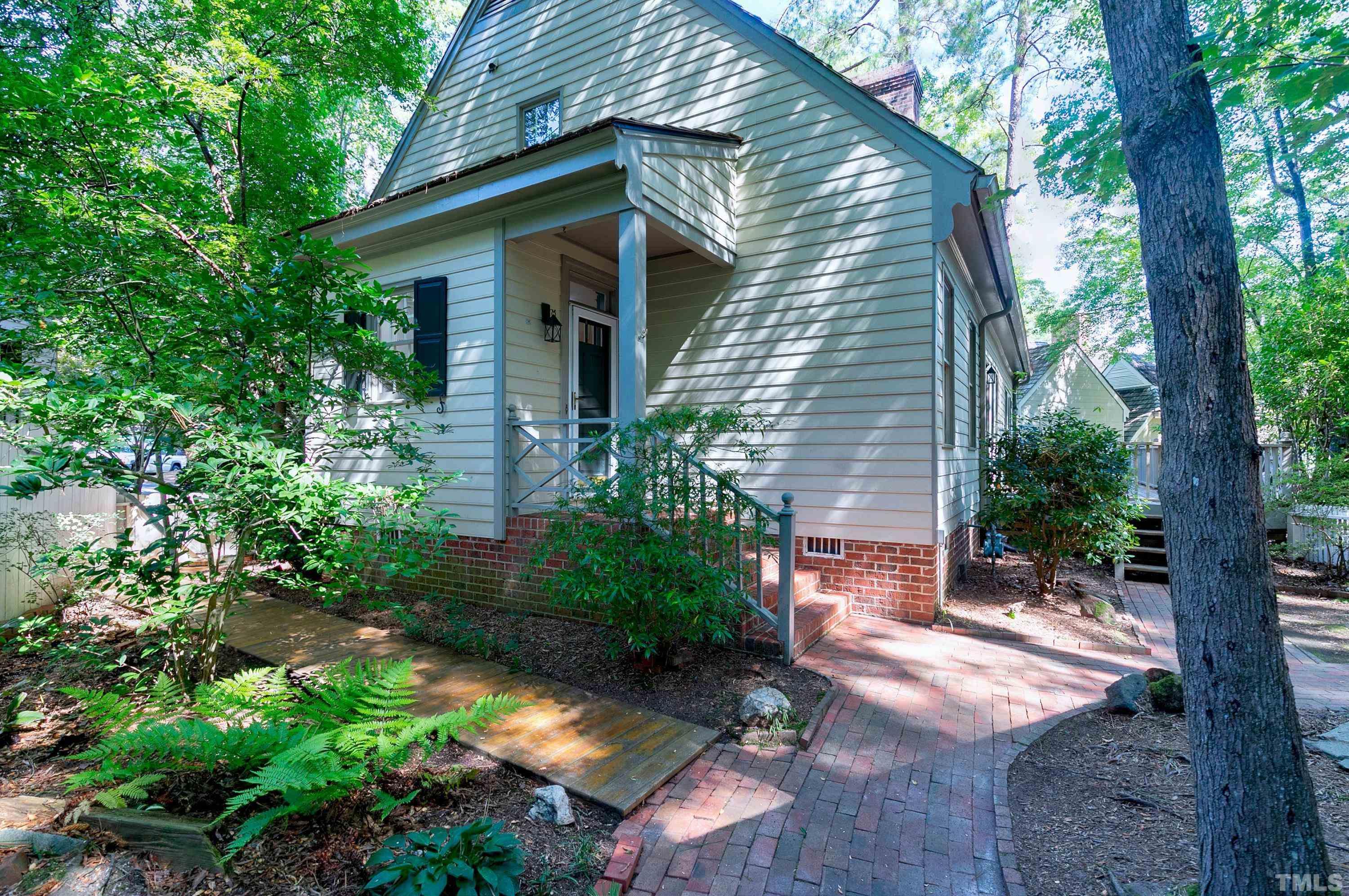 113 Palace Green Cary, NC 27518 - Photo 27 of 32 a front view of a house with a yard