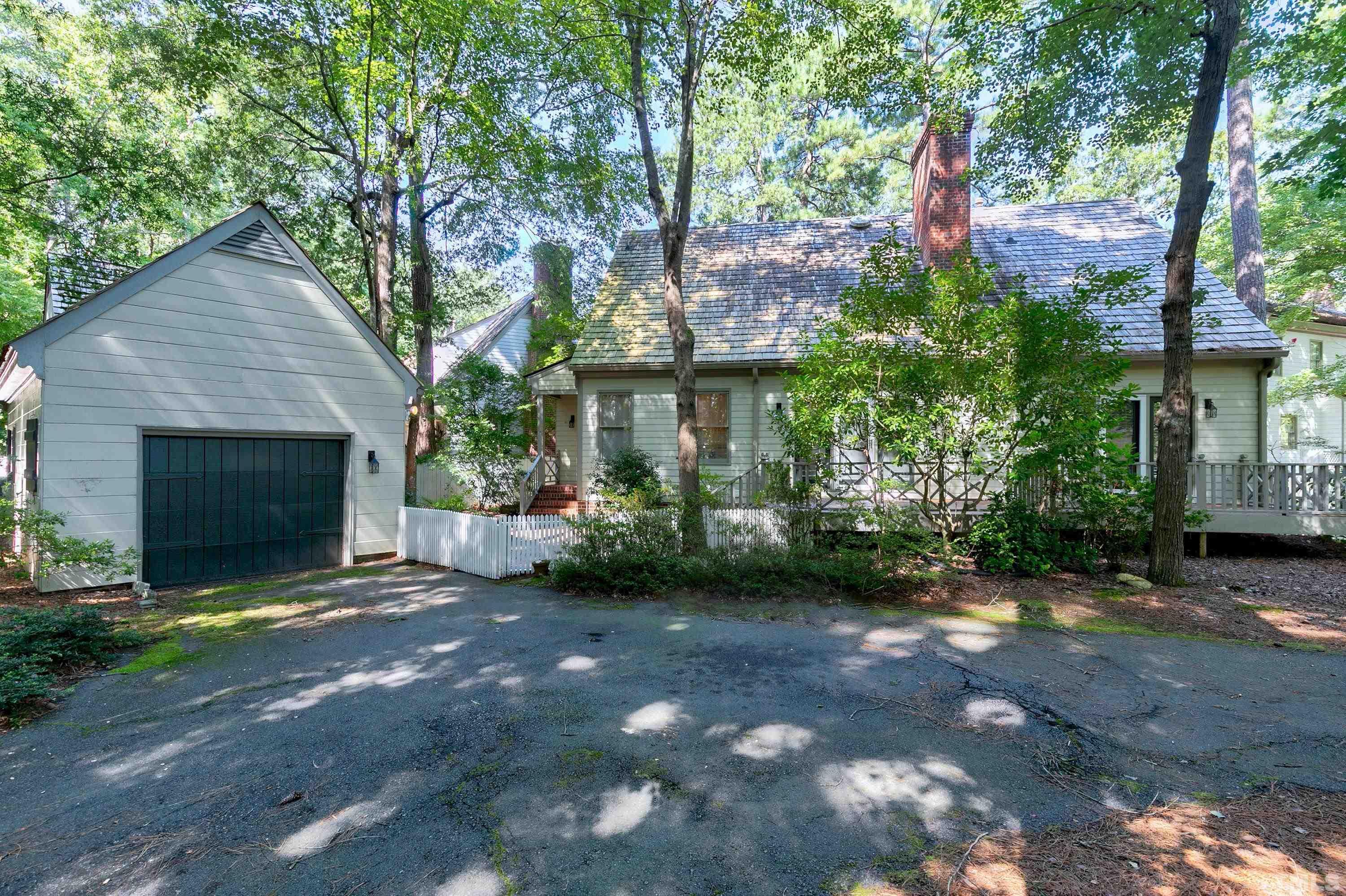 113 Palace Green Cary, NC 27518 - Photo 29 of 32 a view of a house with a yard and tree s