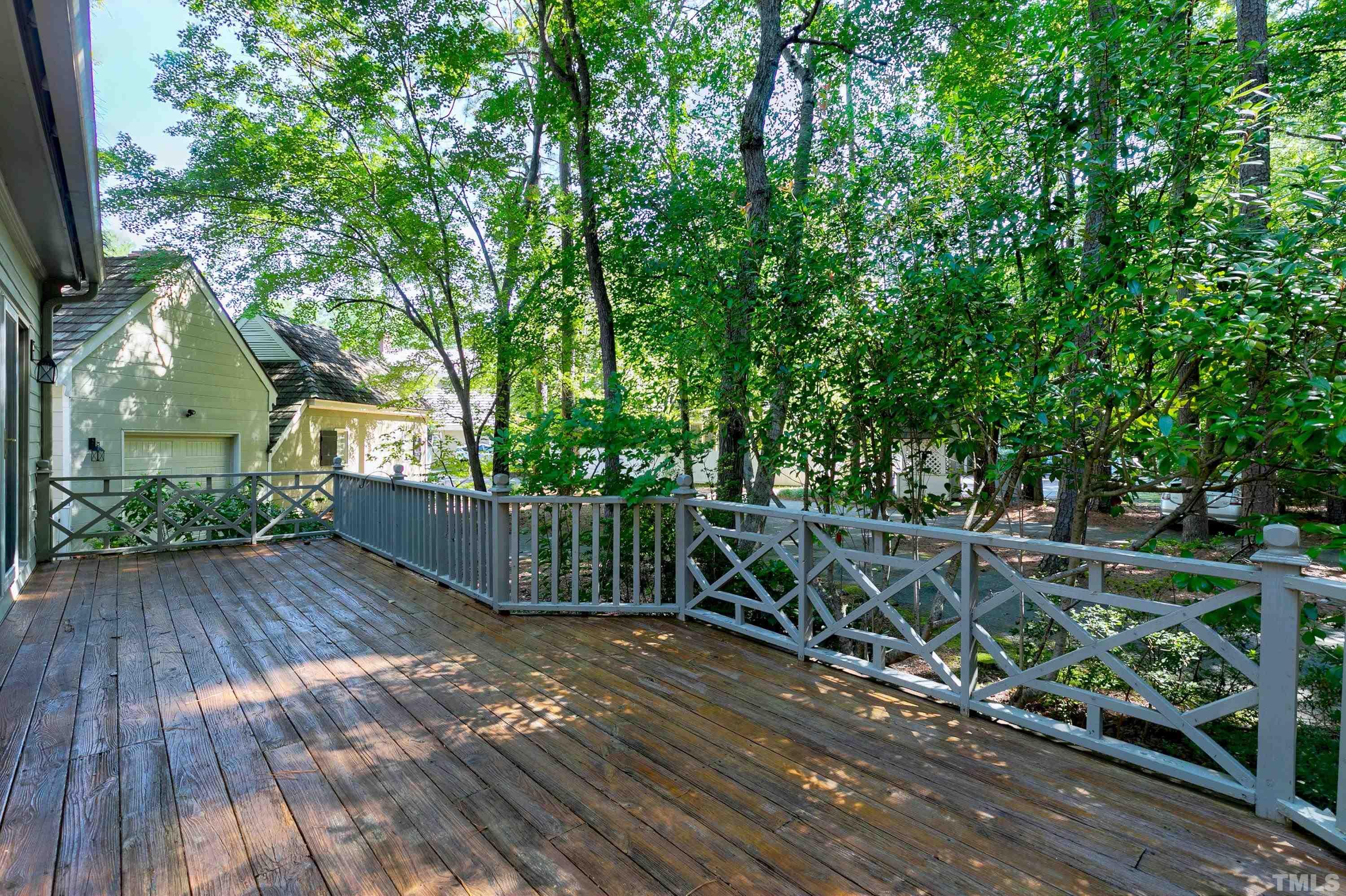 113 Palace Green Cary, NC 27518 - Photo 30 of 32 a view of backyard with green space