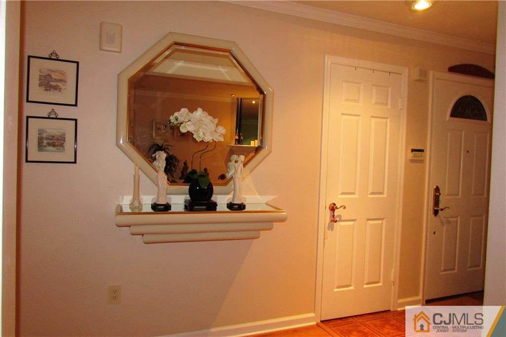 163 Redpine Loop Old Bridge, NJ 08857 - Photo 12 of 20 view of hall way with mirror
