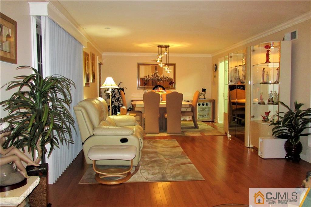 163 Redpine Loop Old Bridge, NJ 08857 - Photo 15 of 20 a living room with furniture and a floor to ceiling window