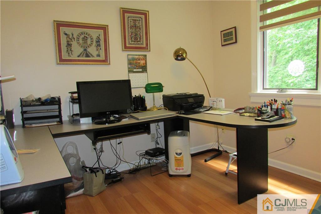 163 Redpine Loop Old Bridge, NJ 08857 - Photo 20 of 20 a view of a workspace with furniture and a window