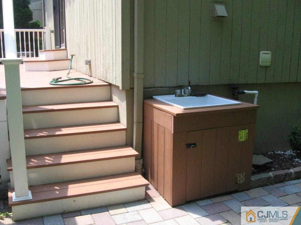 163 Redpine Loop Old Bridge, NJ 08857 - Photo 3 of 20 a bathroom with a sink and a mirror