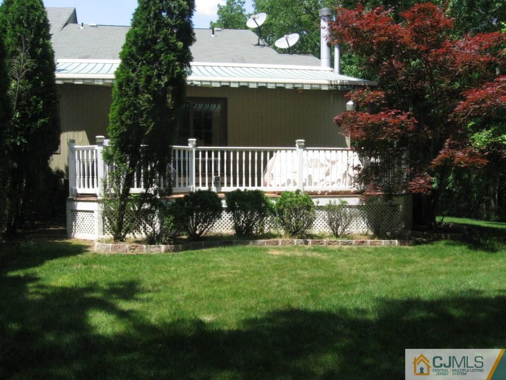 163 Redpine Loop Old Bridge, NJ 08857 - Photo 4 of 20 a view of a house with a yard