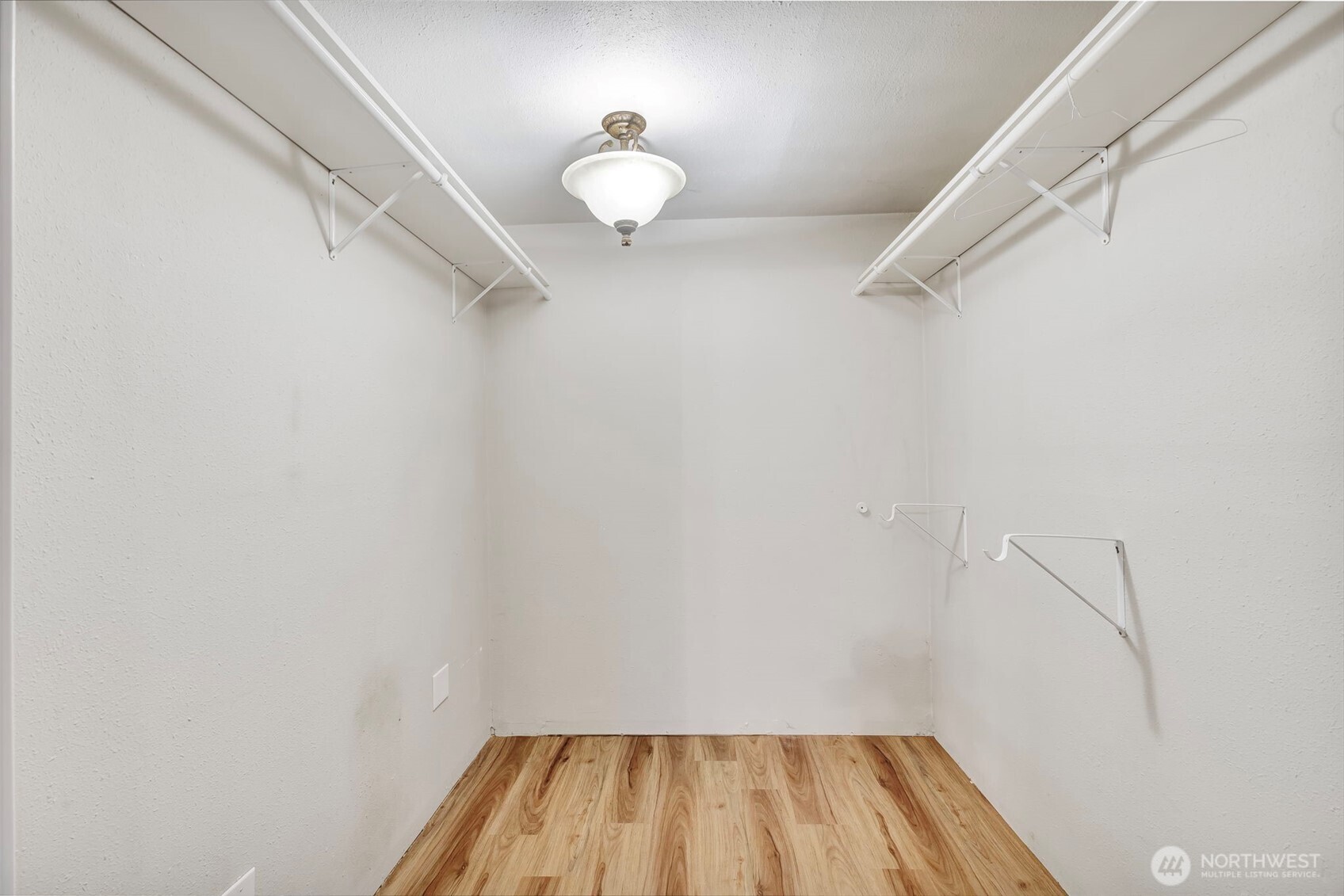 10915 Davisson Road Southwest Lakewood, WA 98499 - Photo 18 of 29 a view of a room with wooden floor and fan