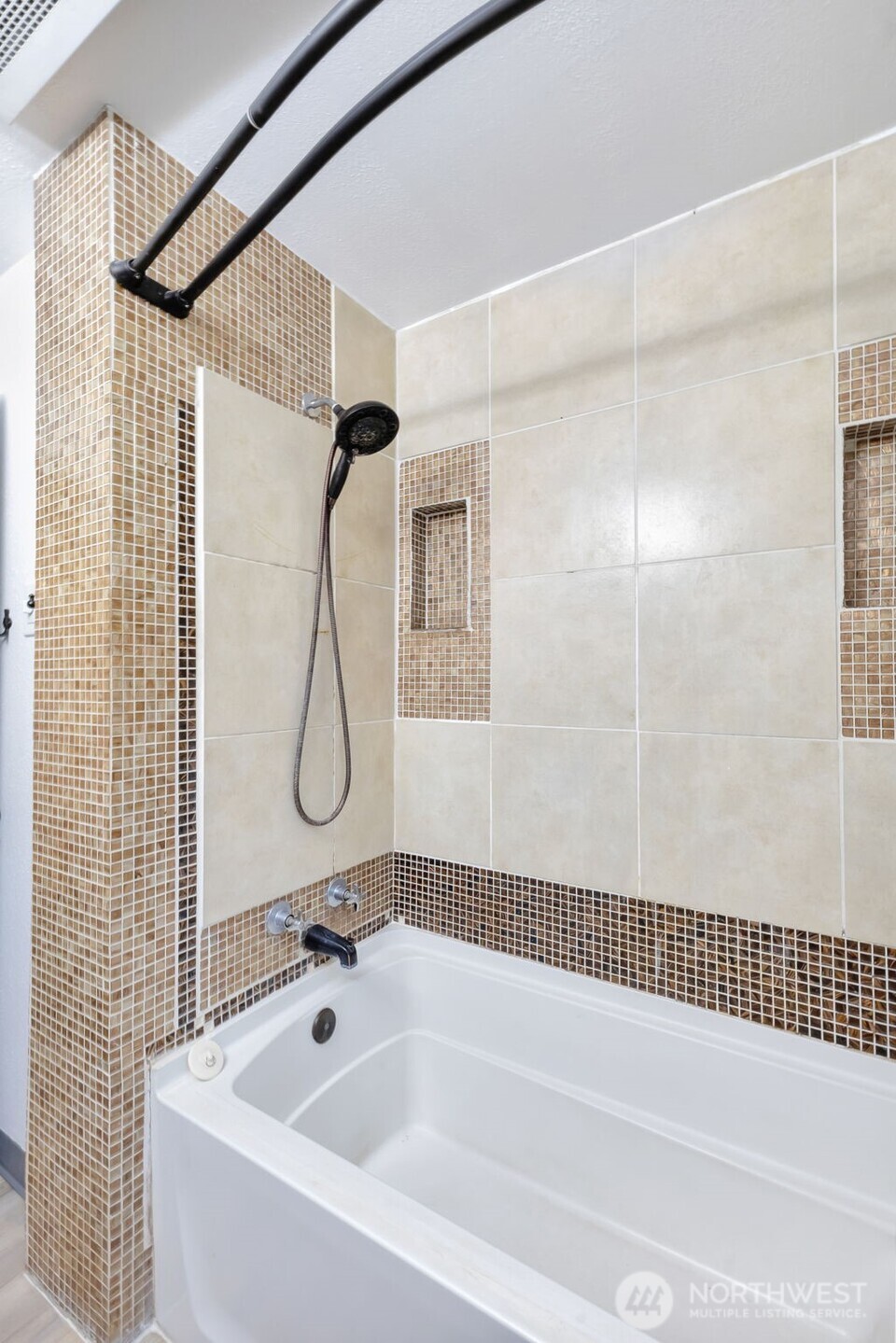 10915 Davisson Road Southwest Lakewood, WA 98499 - Photo 23 of 29 a bathroom with a bath tub with a shower