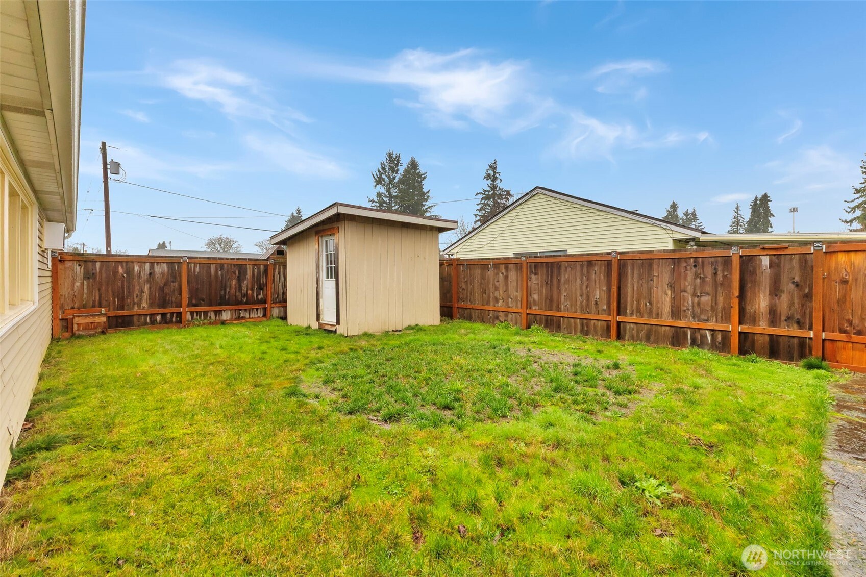 10915 Davisson Road Southwest Lakewood, WA 98499 - Photo 28 of 29 a view of a backyard with a garden