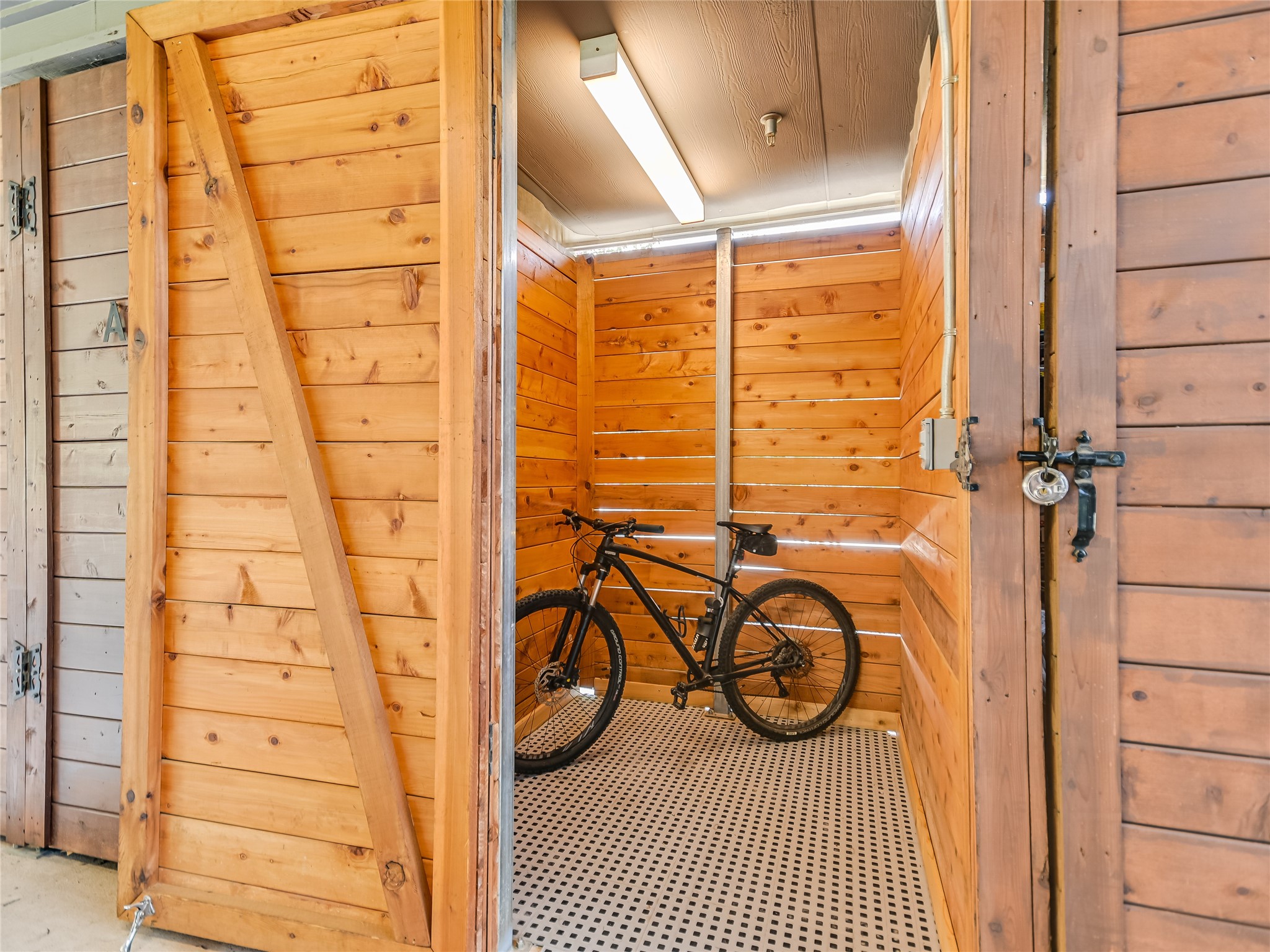 5921 Hiline Road, Unit 1501 Austin, TX 78734 - Photo 26 of 38 The new owner of Unit #1501 also gets a nicely floor-lined storage unit located in the garage. A real bonus as not every Waterfall homeowner gets one!