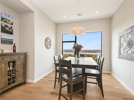 a view of a dining room with furniture