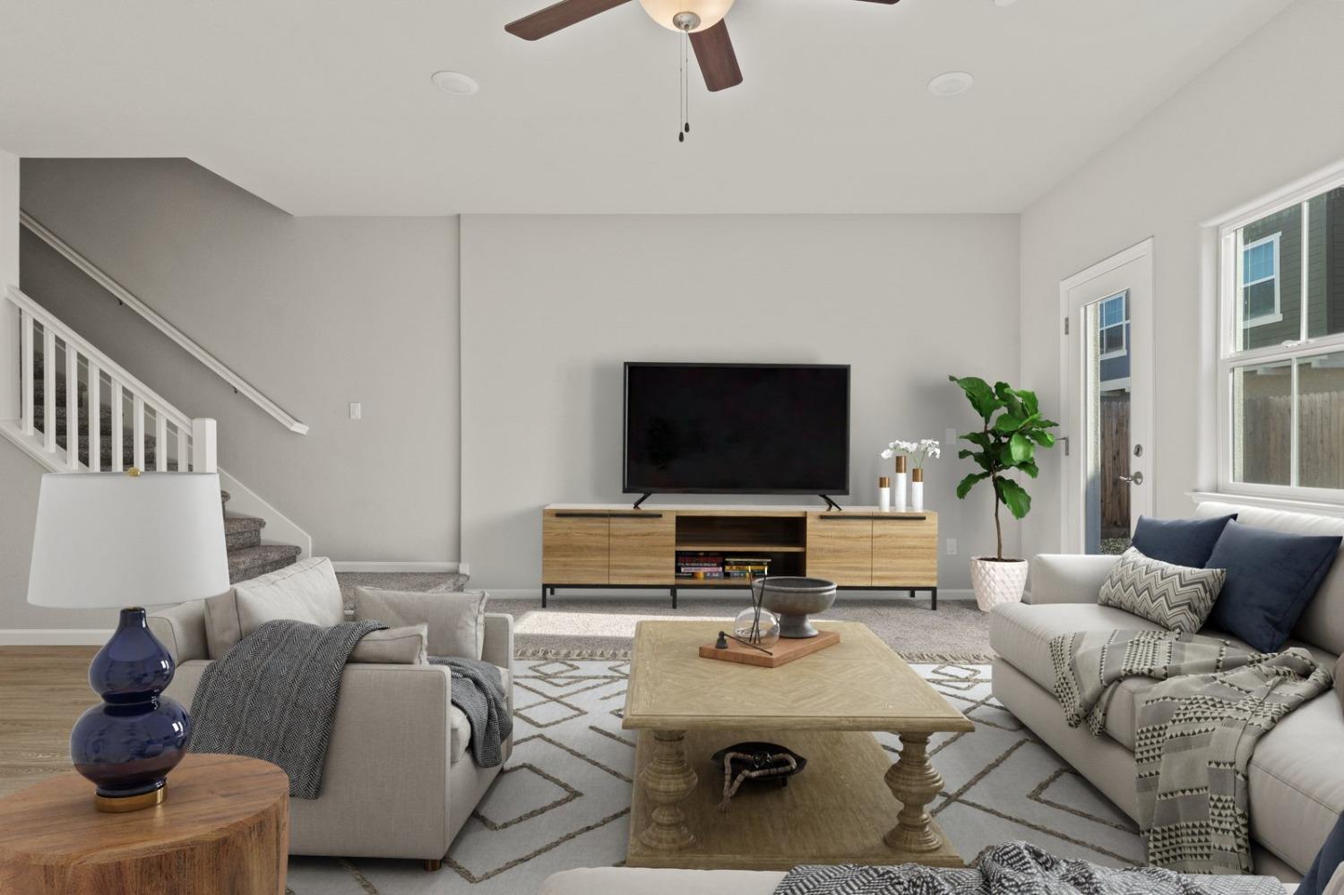 3916 Wickman Loop Rocklin, CA 95677 - Photo 15 of 40 a living room with furniture and a flat screen tv