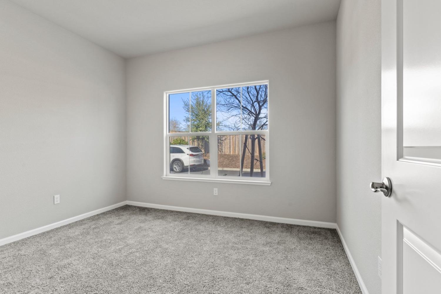 3916 Wickman Loop Rocklin, CA 95677 - Photo 18 of 40 an empty room with windows