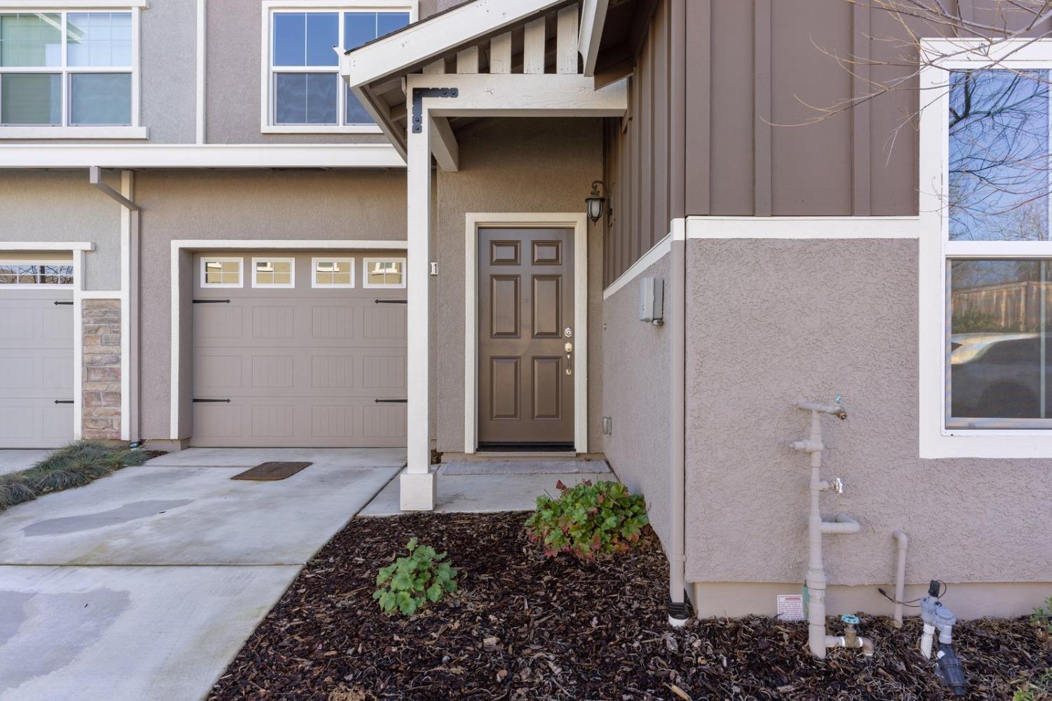 3916 Wickman Loop Rocklin, CA 95677 - Photo 4 of 40 a front view of a house with a yard