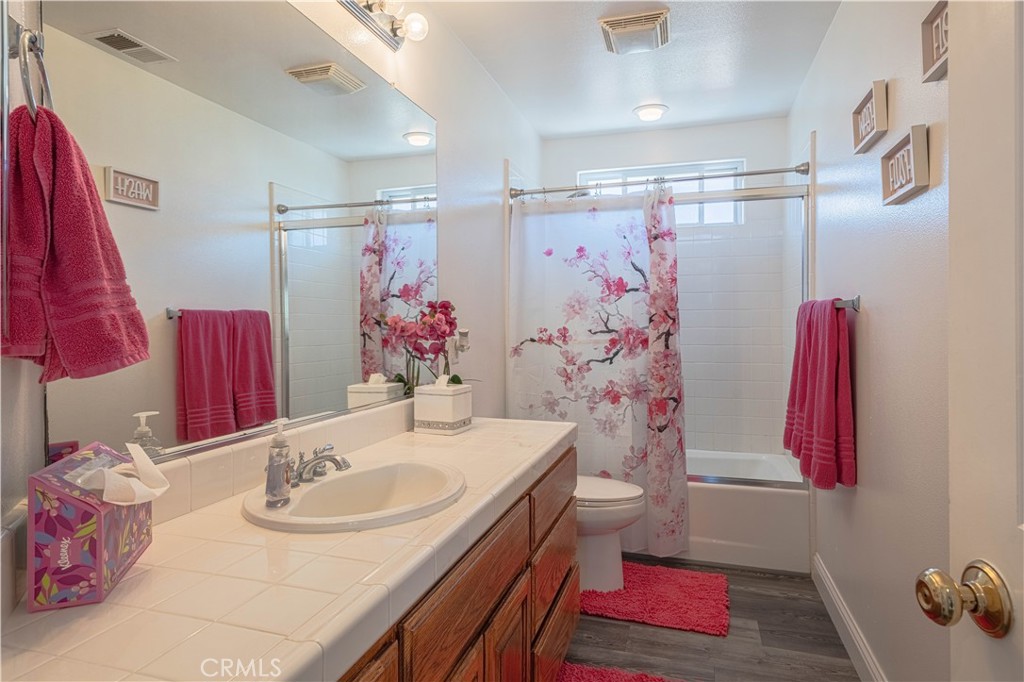 429 Tudor Way Salinas, CA 93906 - Photo 16 of 41 a bathroom with a sink and a mirror