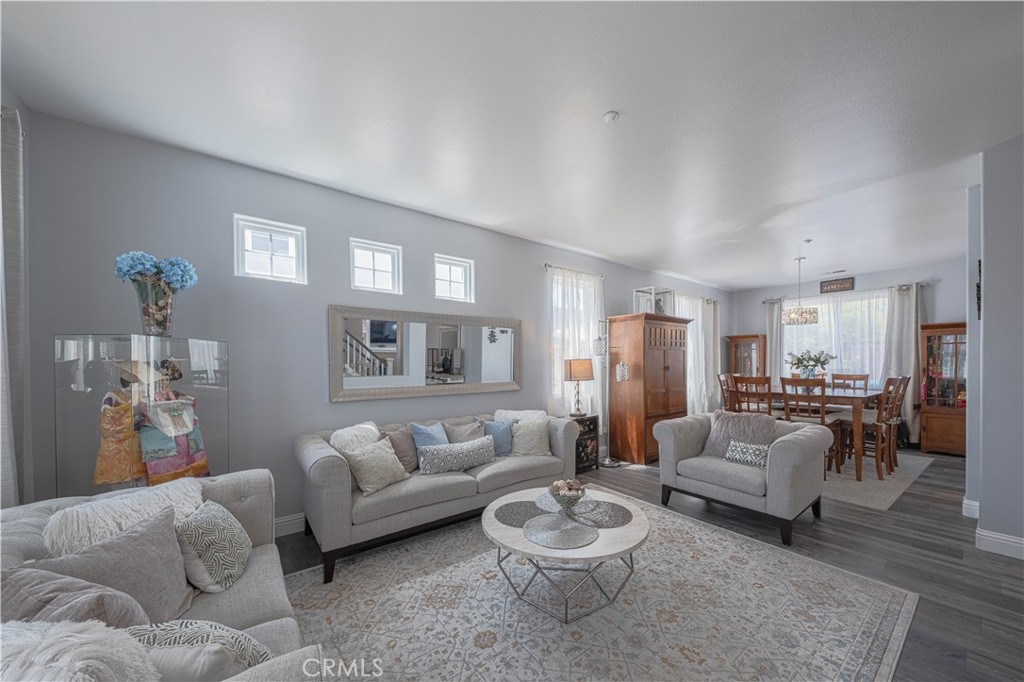 429 Tudor Way Salinas, CA 93906 - Photo 3 of 41 a living room with furniture and a wooden floor