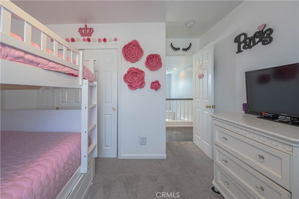 429 Tudor Way Salinas, CA 93906 - Photo 34 of 41 a bedroom with a bed and a flat screen tv