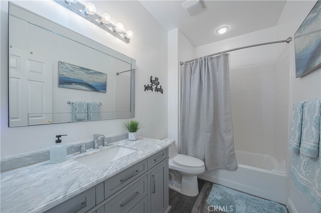 429 Tudor Way Salinas, CA 93906 - Photo 7 of 41 a bathroom with a granite countertop sink toilet and shower