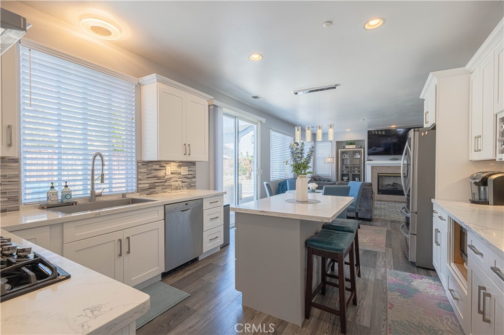 429 Tudor Way Salinas, CA 93906 - Photo 8 of 41 a kitchen with a sink a counter top stainless steel appliances and cabinets