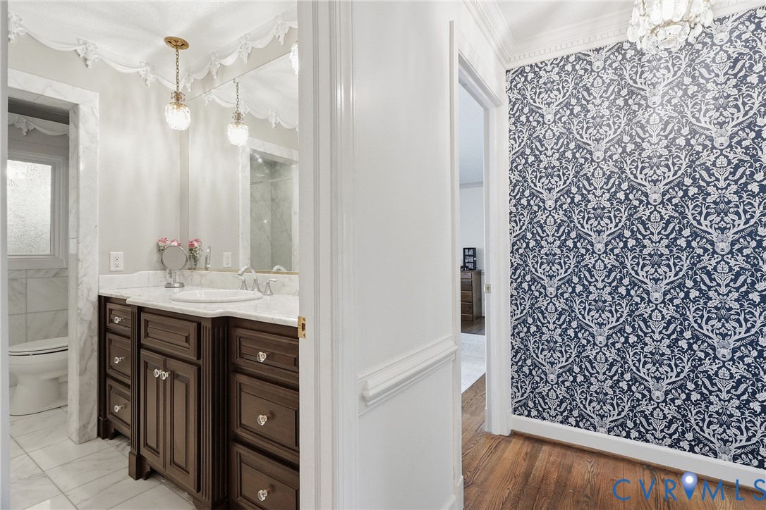 13300 West Patrick Henry Road Doswell, VA 23047 - Photo 20 of 69 Bathroom featuring a wood-finish vanity with a lig