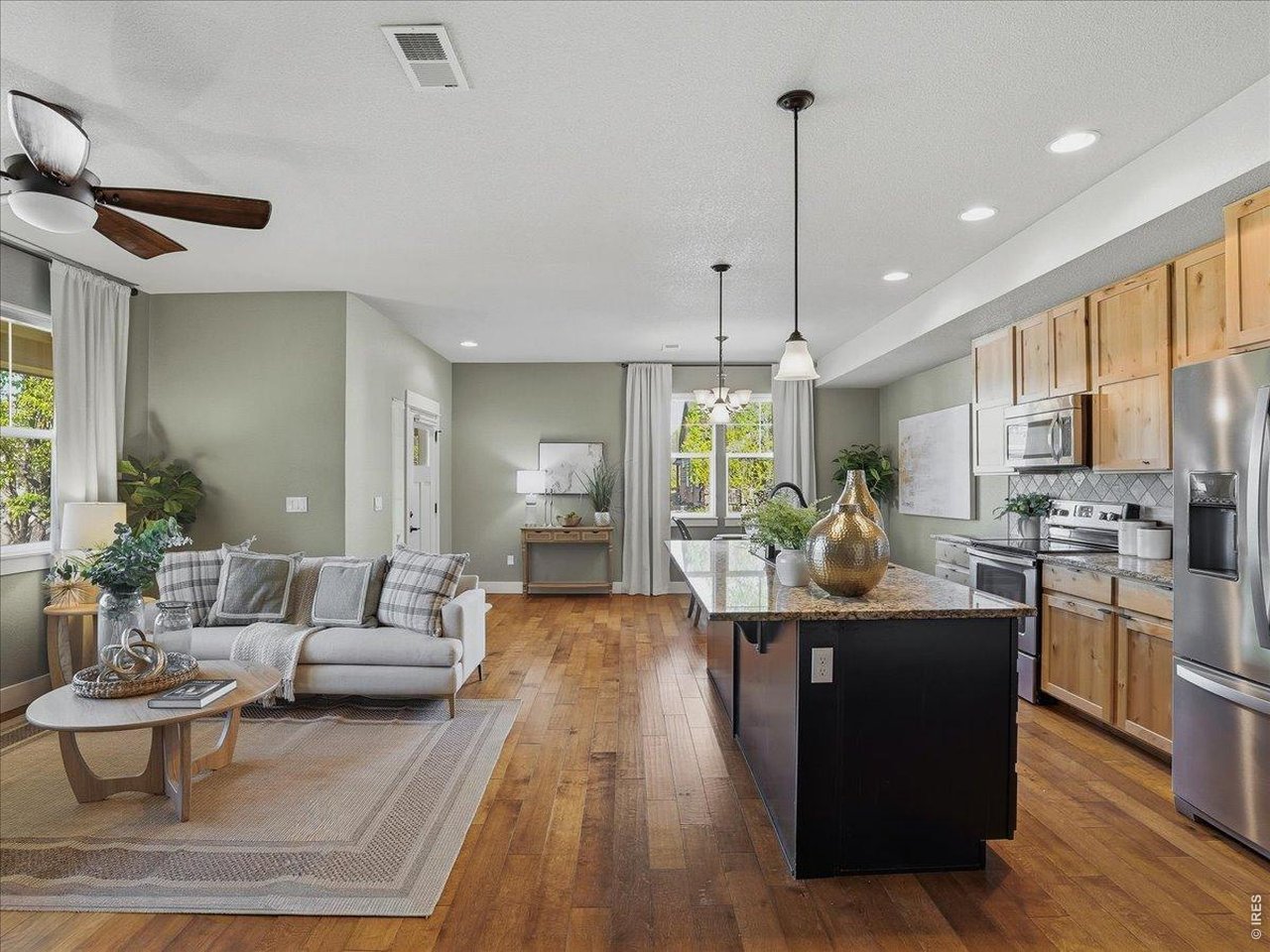 2065 Scarecrow Road Fort Collins, CO 80525 - Photo 18 of 50 Living room, kitchen and dining all work nicely together