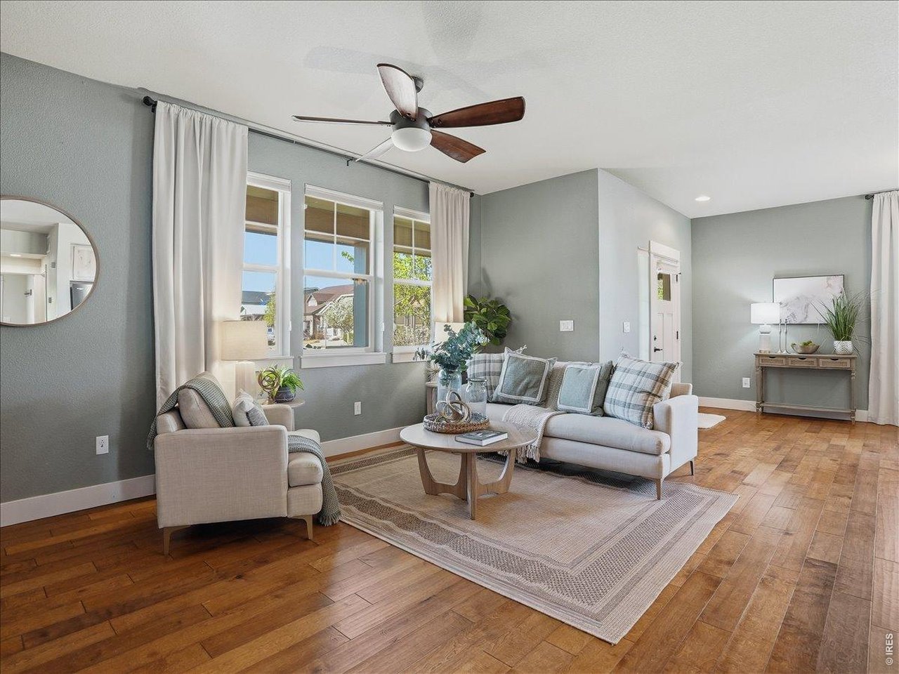 2065 Scarecrow Road Fort Collins, CO 80525 - Photo 23 of 50 living room with beautiful wood flooring