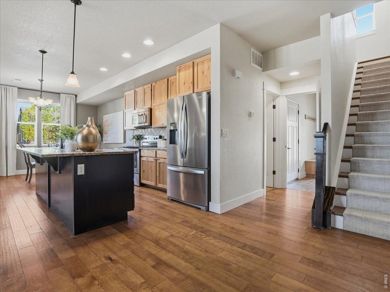 2065 Scarecrow Road Fort Collins, CO 80525 - Photo 27 of 50 Hallway leading to bathroom, laundry & garage