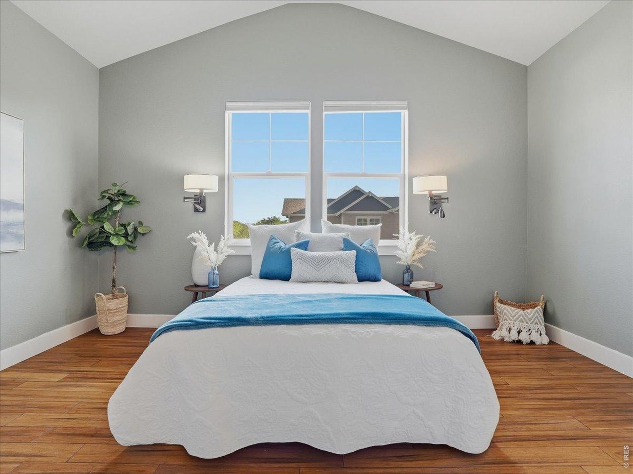 2065 Scarecrow Road Fort Collins, CO 80525 - Photo 30 of 50 Primary bedroom with vaulted ceilings and ceiling fan