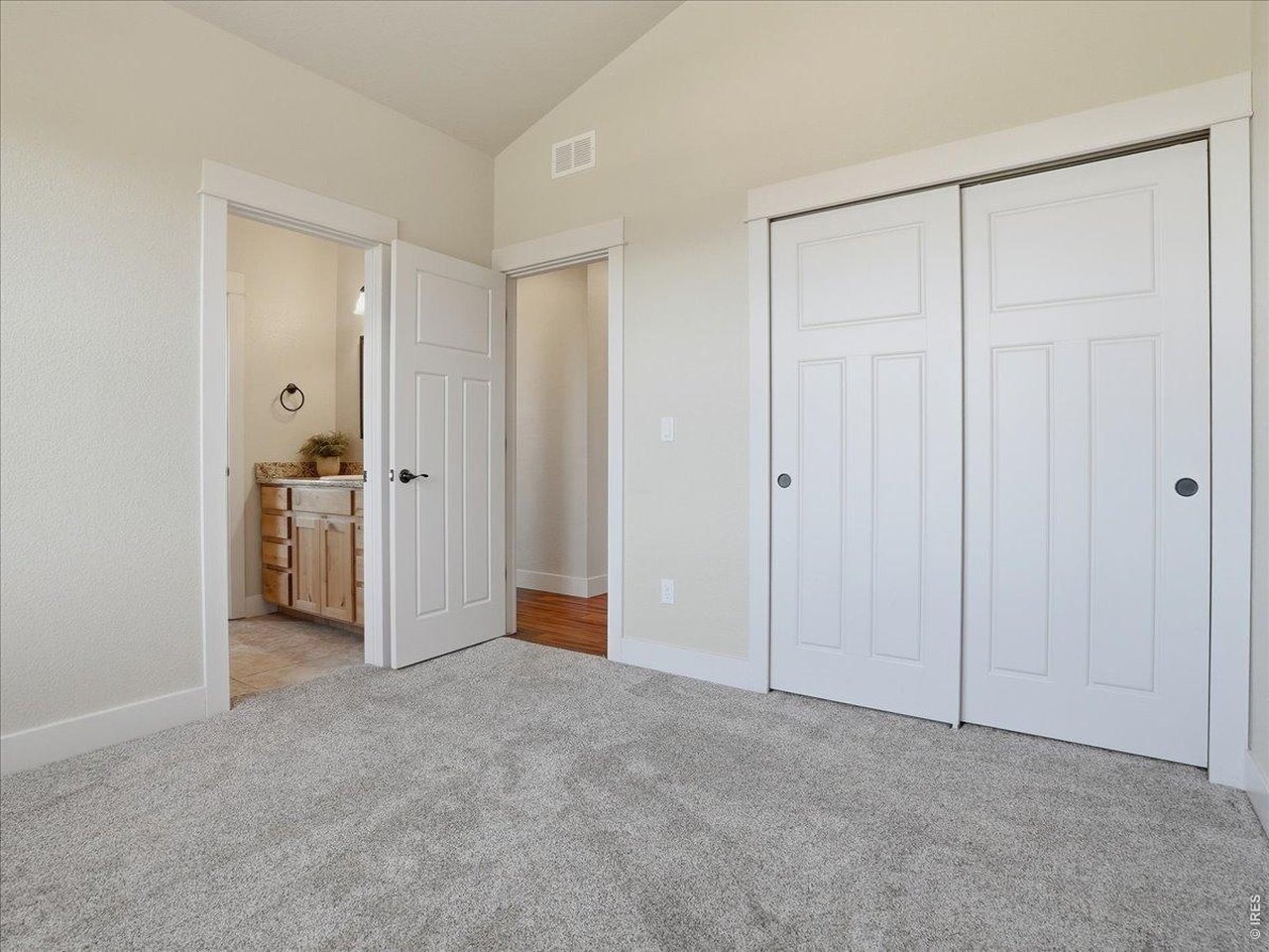 2065 Scarecrow Road Fort Collins, CO 80525 - Photo 36 of 50 Bedroom 3 upstairs (vaulted), double closet and cool bench seat with extra storage (overlooking the park)