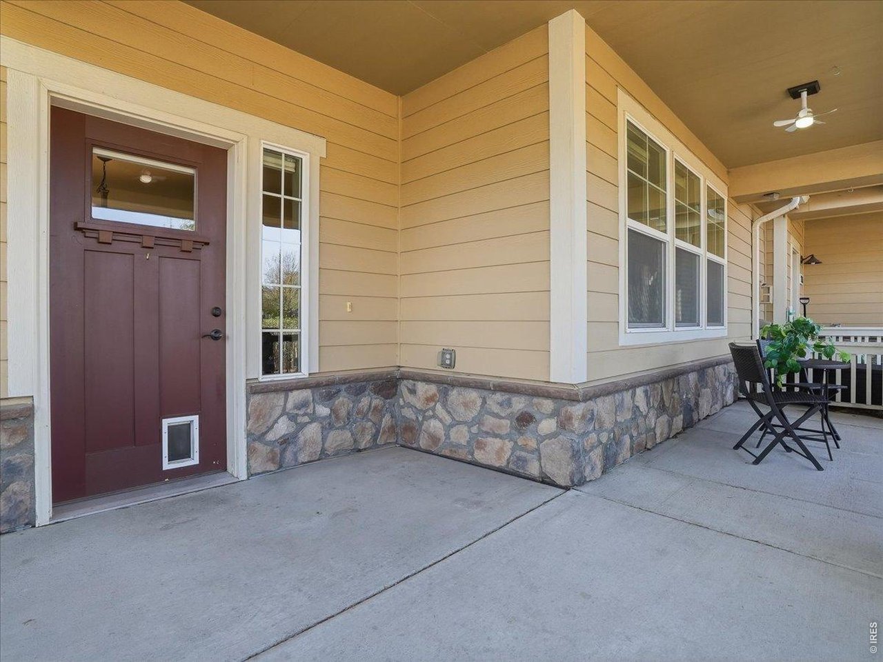 2065 Scarecrow Road Fort Collins, CO 80525 - Photo 9 of 50 Enjoy the covered front porch - add your outdoor fan and twinkle lights and you are all set!