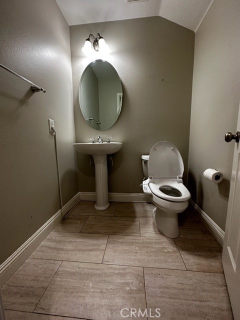 11 Corte Javier San Clemente, CA 92673 - Photo 13 of 30 a bathroom with a toilet and a mirror