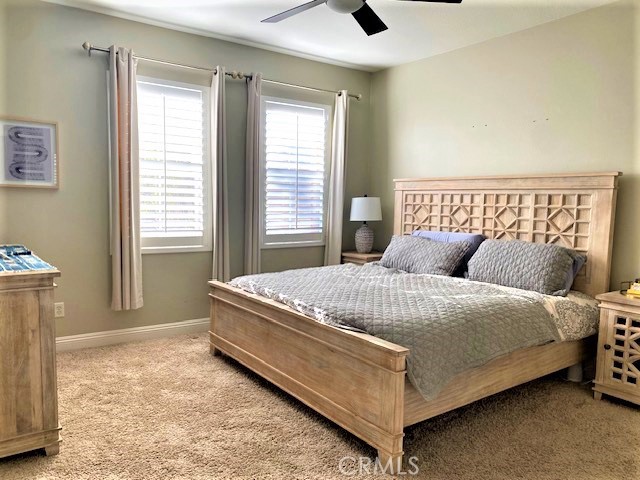 11 Corte Javier San Clemente, CA 92673 - Photo 17 of 30 a large bed sitting in a bedroom next to a window