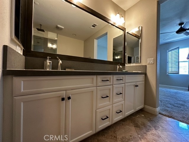 11 Corte Javier San Clemente, CA 92673 - Photo 19 of 30 a bathroom with a granite countertop sink vanity and mirror