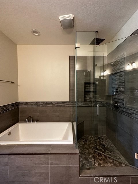 11 Corte Javier San Clemente, CA 92673 - Photo 21 of 30 a bathroom with a bathtub and a shower